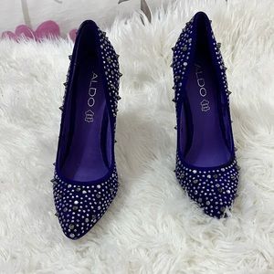 Slightly worn women Aldo purple heels sz 6